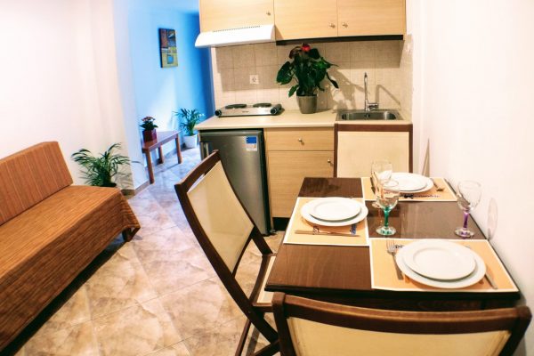 One Bedroom Triple Apartment with Sea View Dining Area and Kitchenette